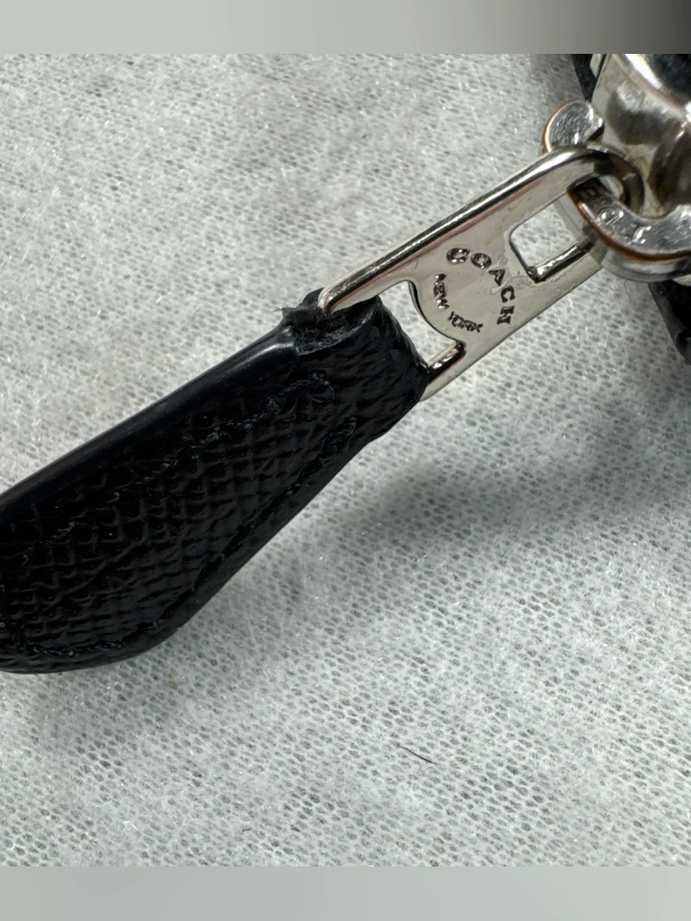 Coach sleek zip